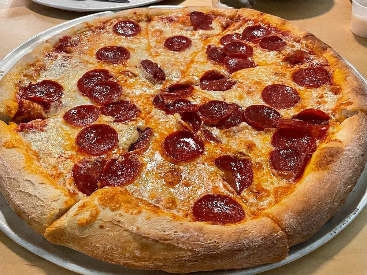 Pepperoni Classic — Double pepperoni, mozzarella, tomato sauce